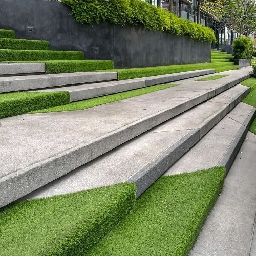 a picture of some concrete steps covered with Artificial grass in Leicester
