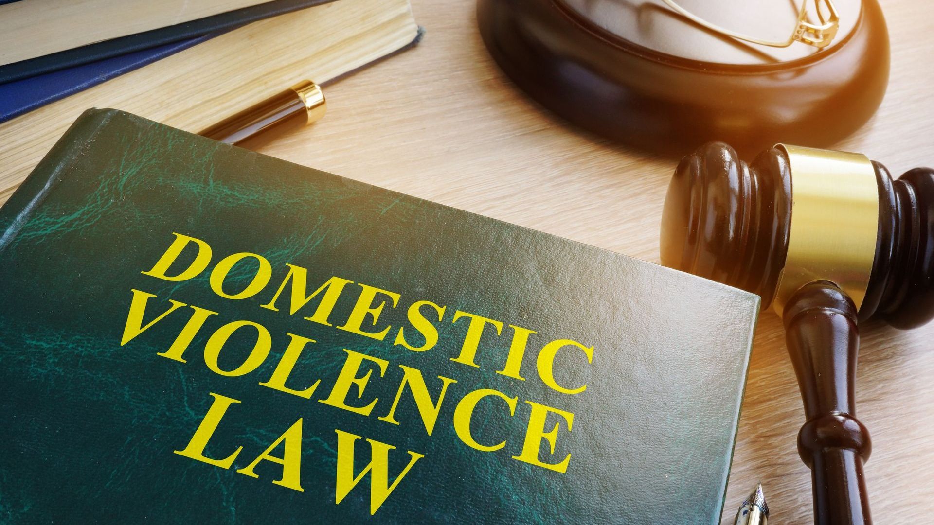 domestic violence law book and gavel