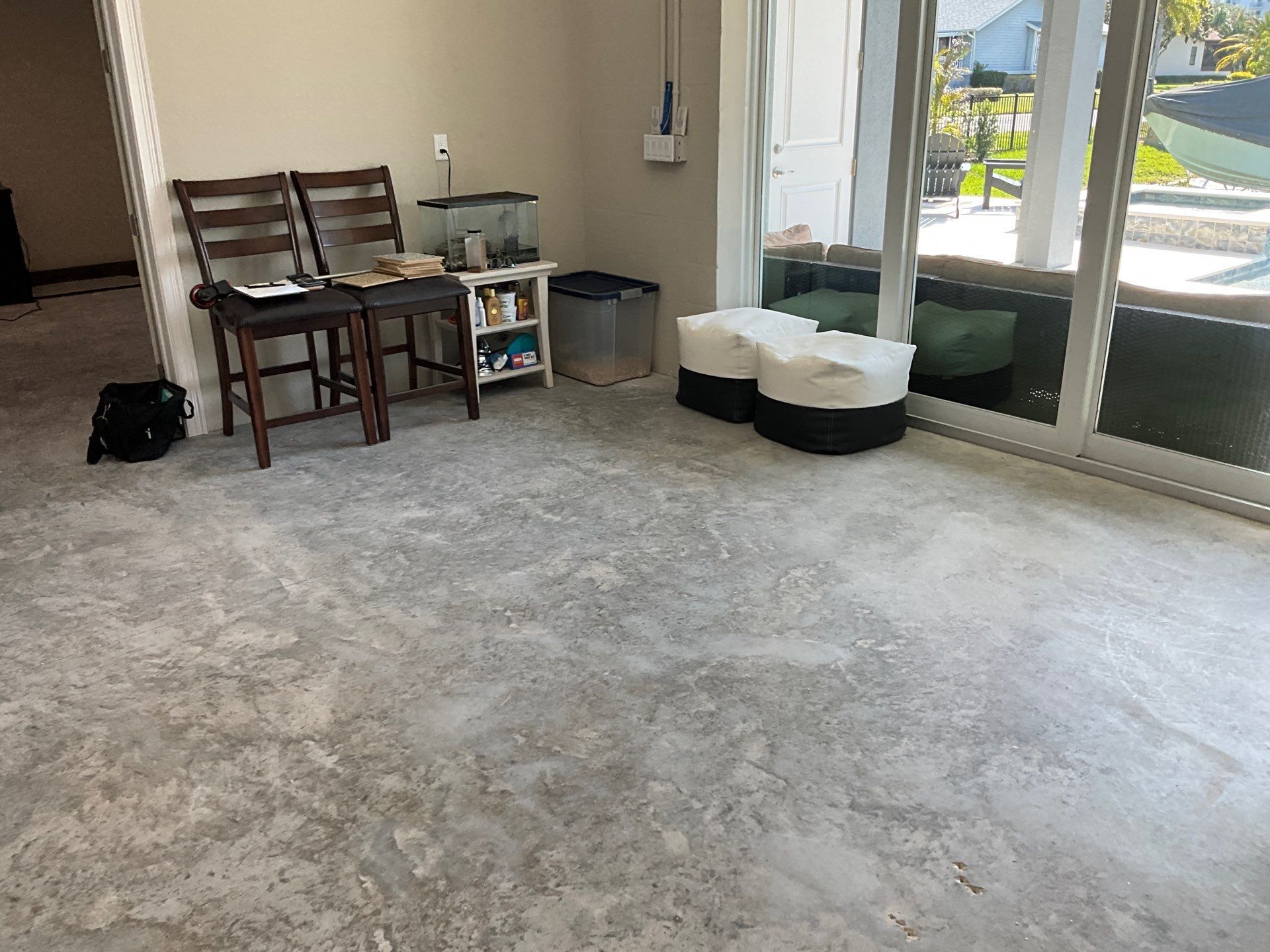 interior room with dirty and bare concrete floor