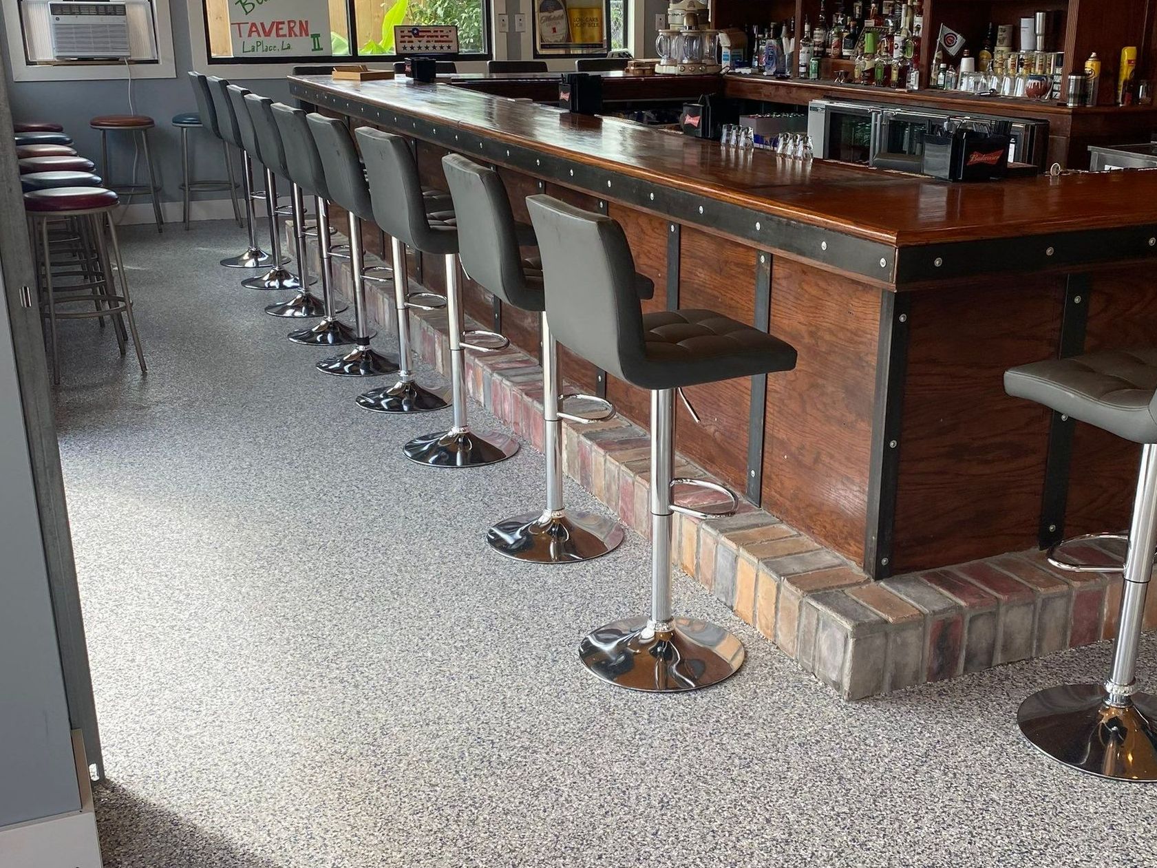 Bar floor with new concrete coating