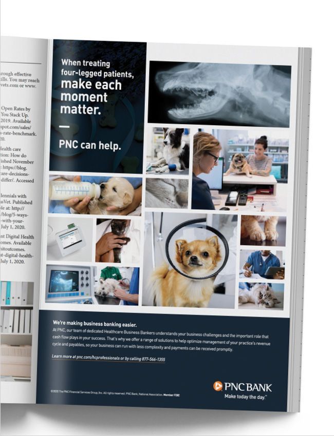 a magazine is open to an advertisement for pnc bank .