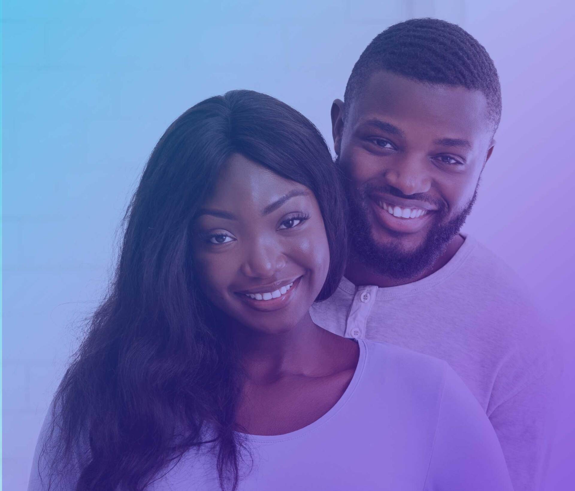 A man and a woman are posing for a picture together and smiling at PFC.