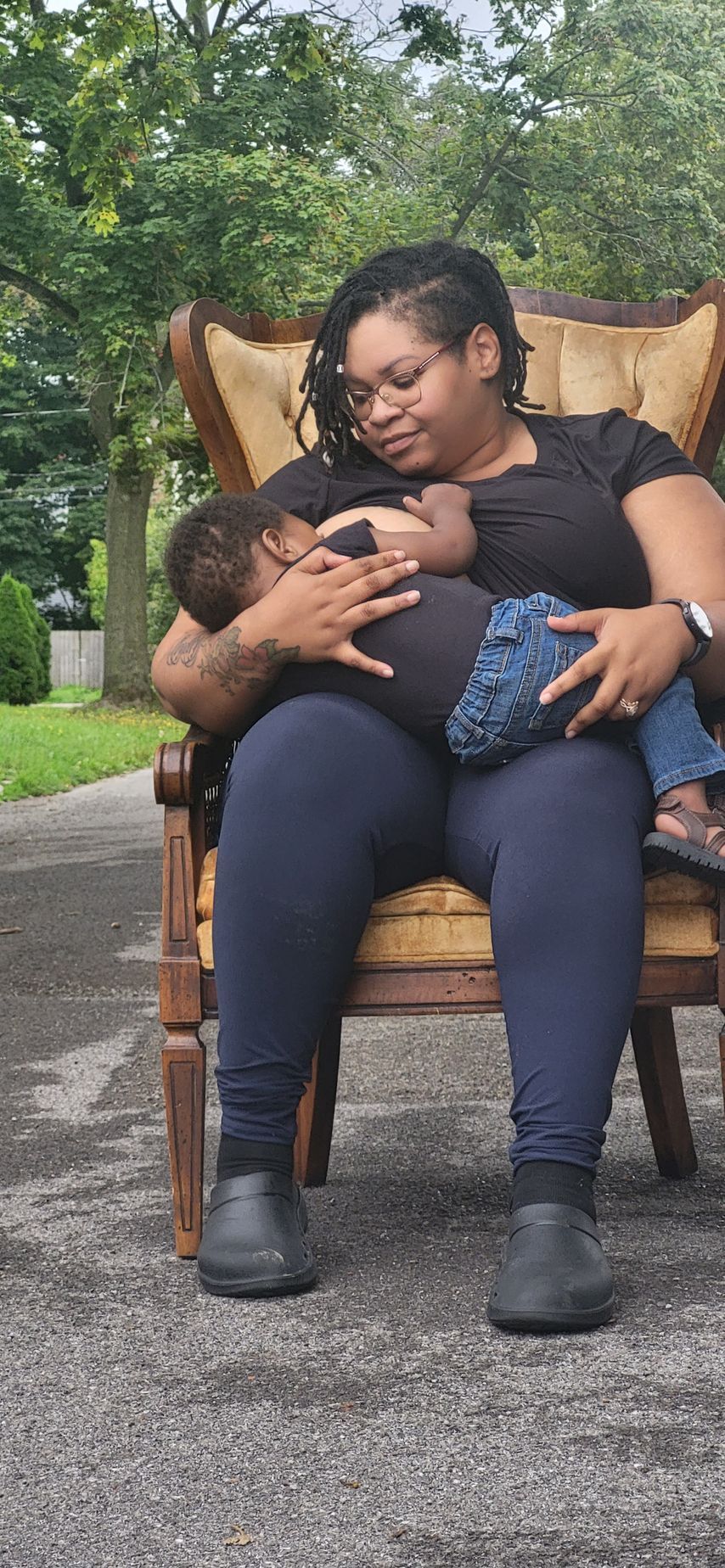 Image of Our Mommie Village mom breastfeeding her baby at a monthly meetup