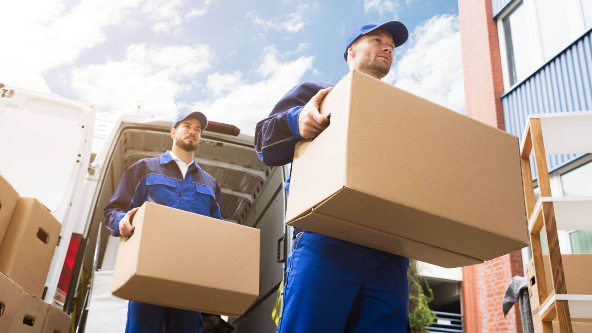 Man Hand Accepting A Delivery Boxes From Deliveryman At Home