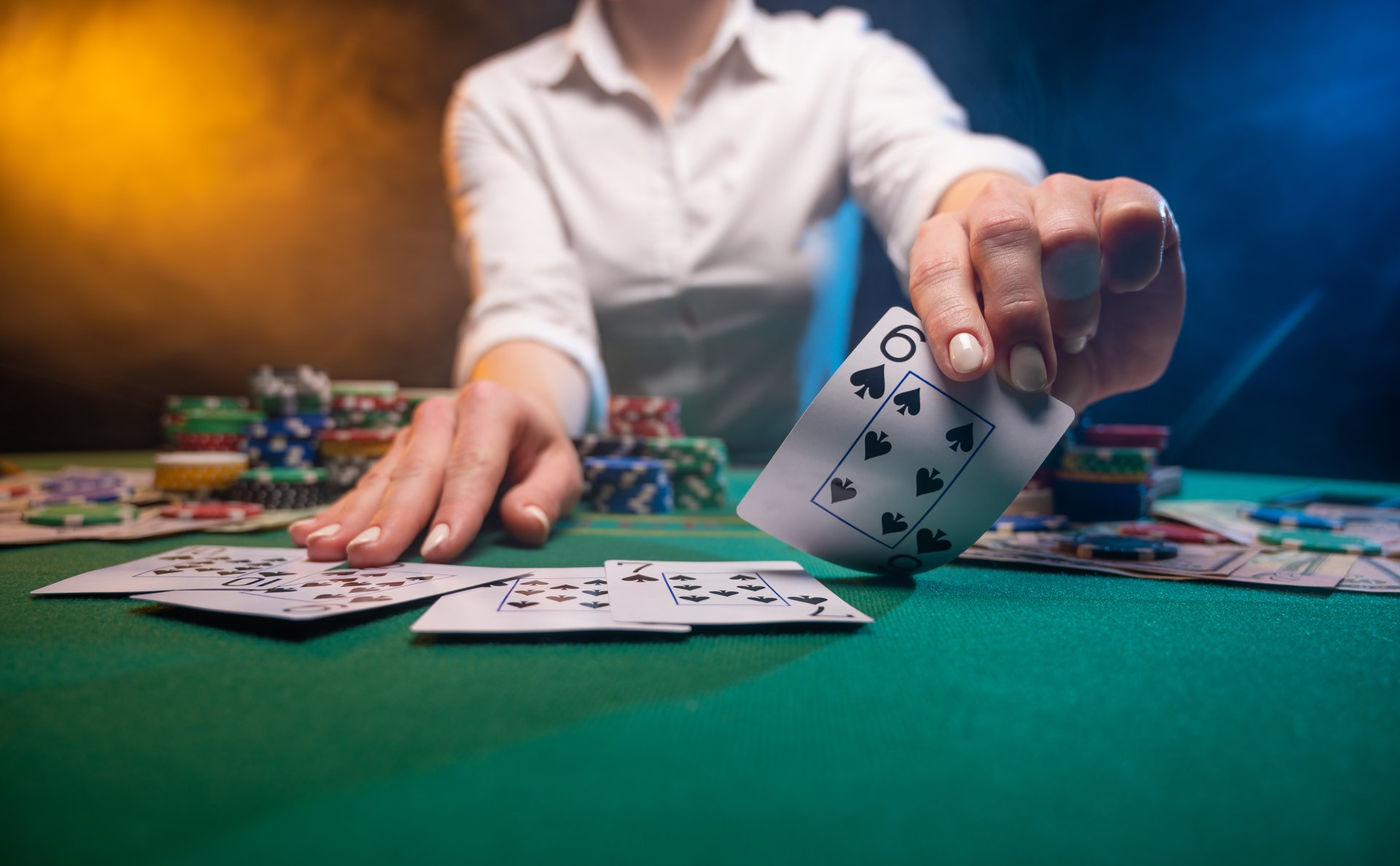 A close view of Ultimate Texas Hold'Em table with a game in progress.