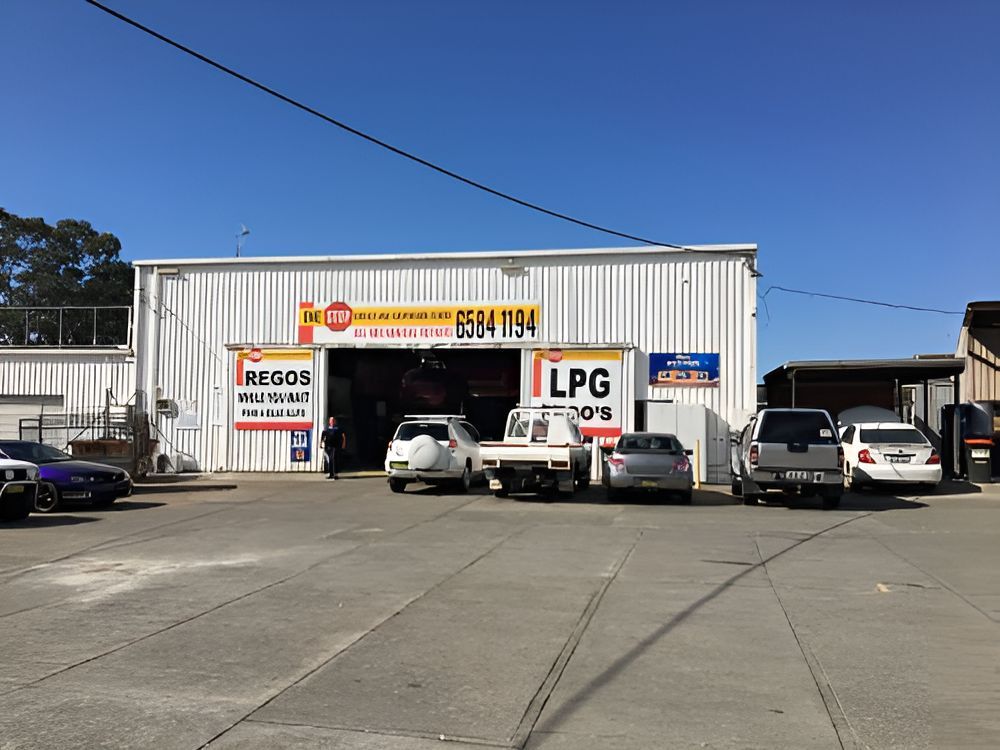 A LPG Gas Station With Cars Parked in Front of It — One Stop Service and Suspension Centre In Port Macquarie, NSW