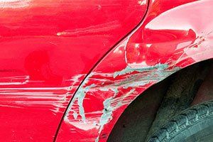Auto Collision Shop — Red Damaged Car in Moraine, OH