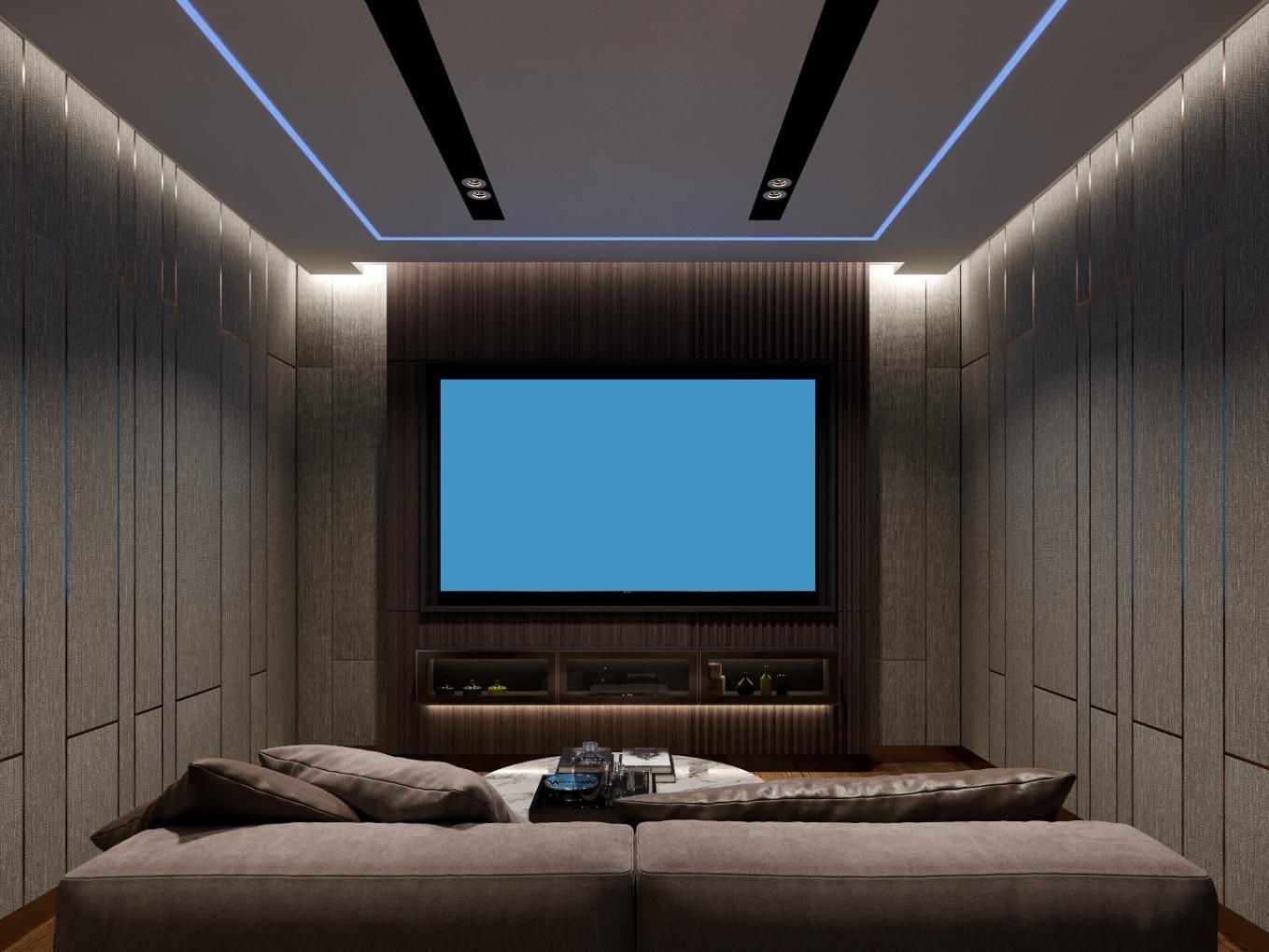 Modern home theater with a large blue screen, recessed lighting, and a sectional sofa in the foreground