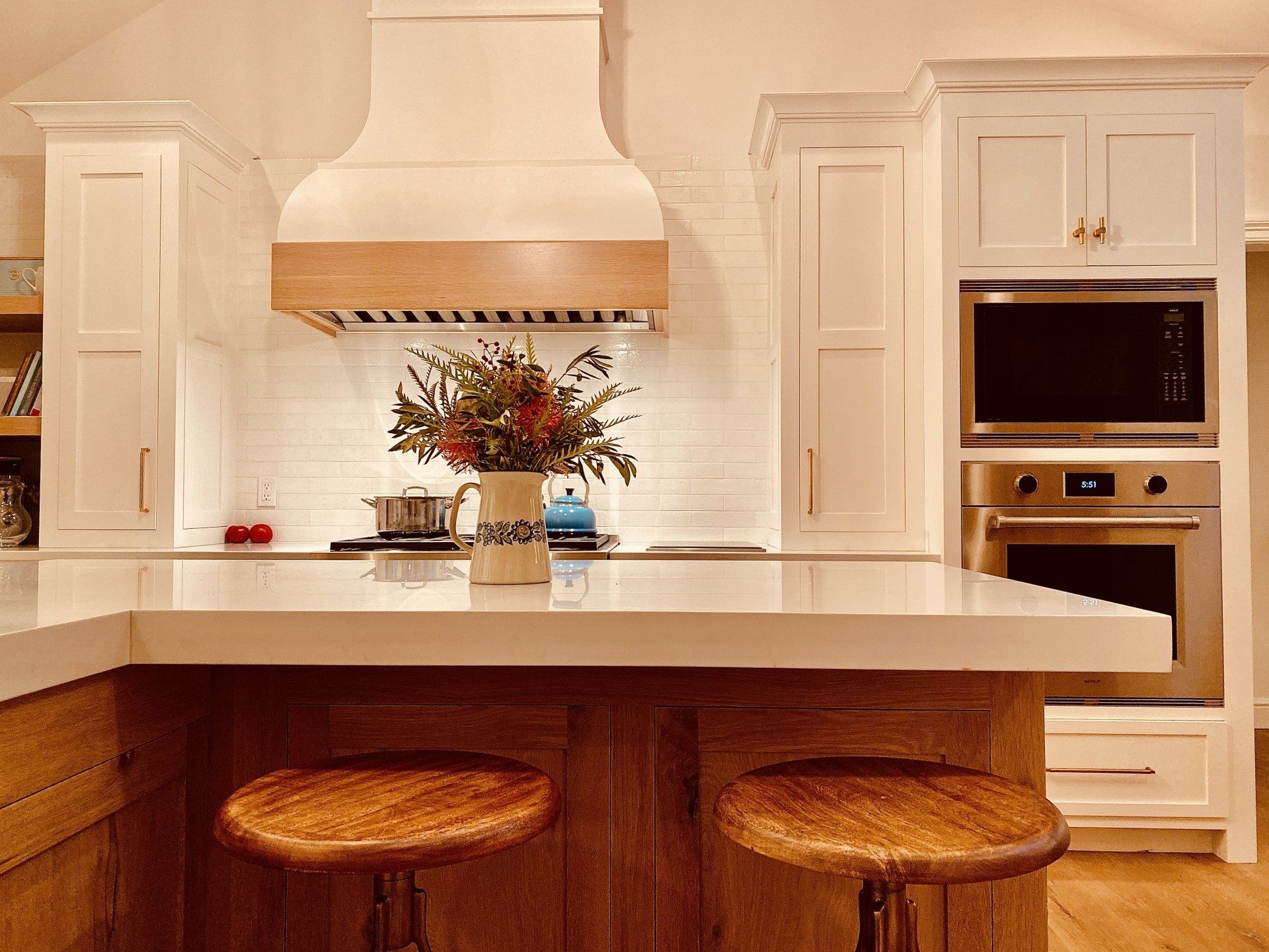White Kitchen Cabinets & White Gas Range with Backsplash  | Custom Kitchen Cabinets | Domestic Kitchen Inc.
