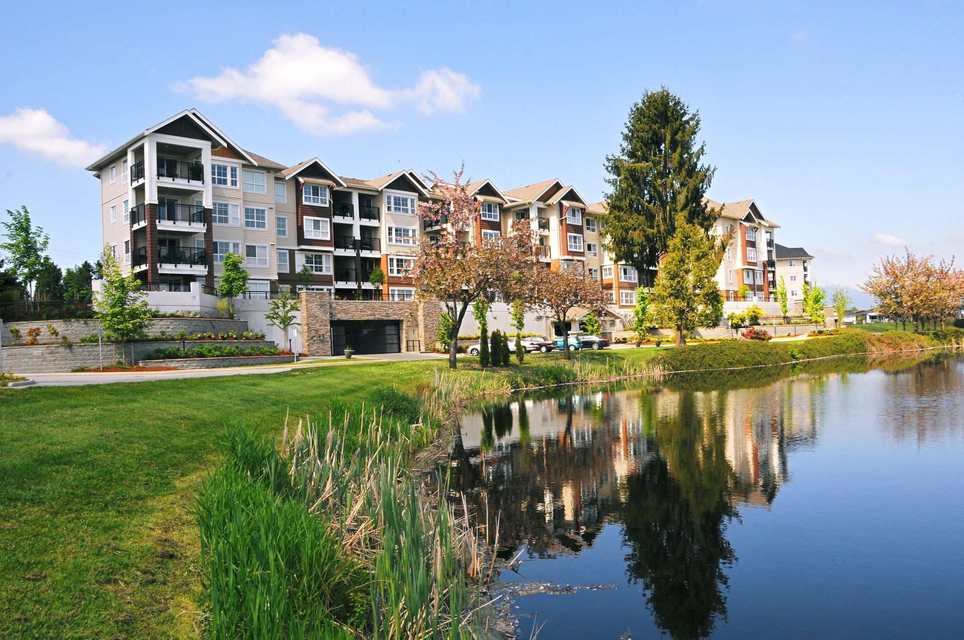 an aerial view of a residential neighborhood filled with lots of houses and trees .