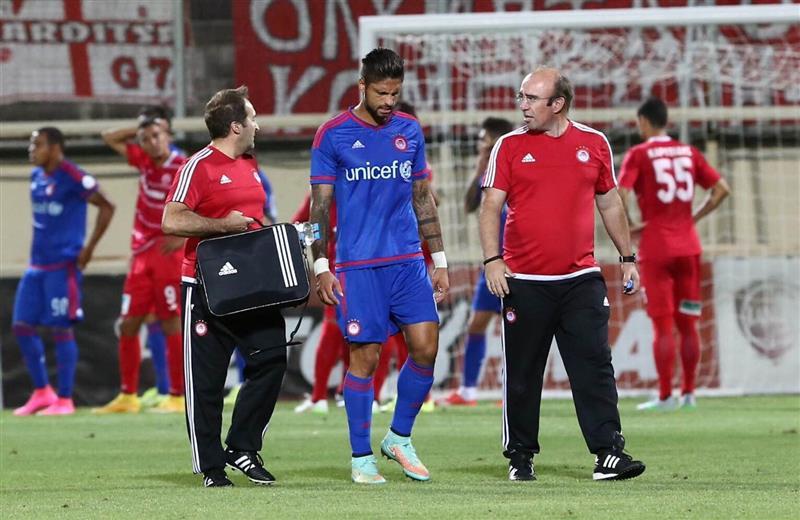 Dr. Christos Theos working with professional football teams and athletes