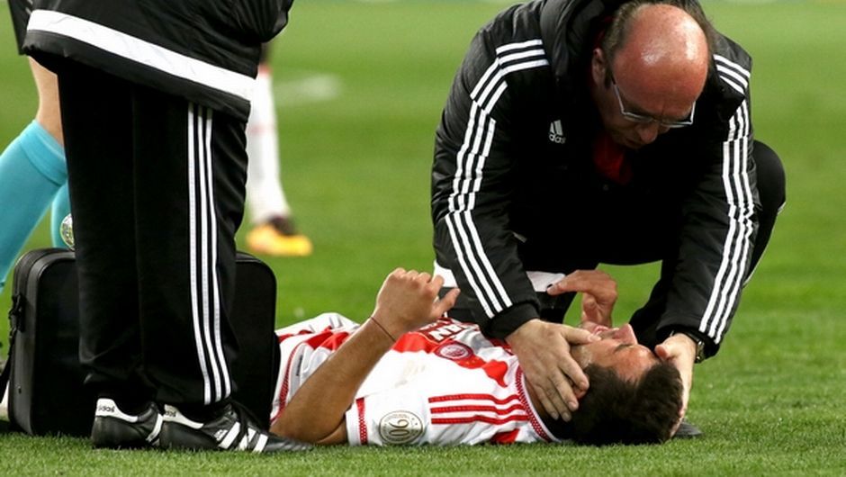 Dr. Christos Theos working with professional football teams and athletes