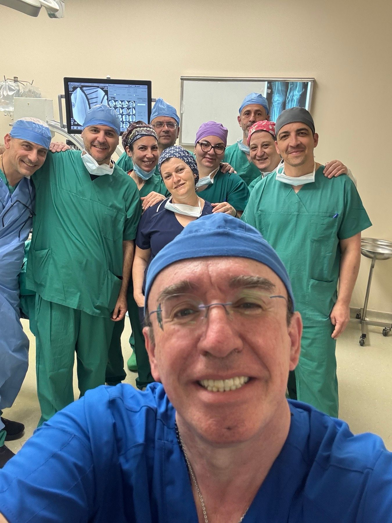 With colleagues / surgical team