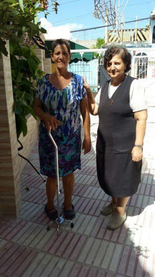 Woman receives a new cane in the Dominican Republic.