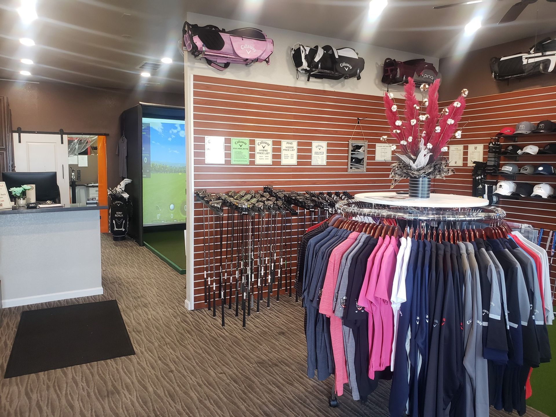 A store with a lot of clothes hanging on racks