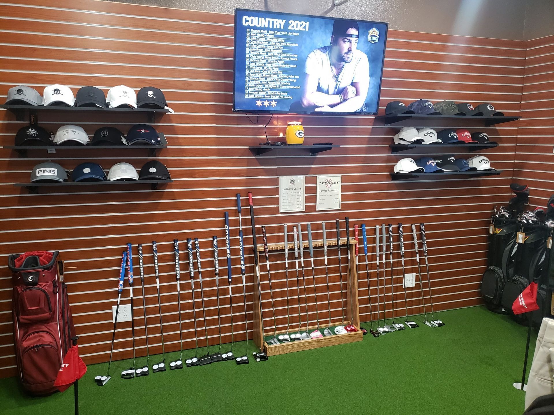 A display of golf clubs and hats in a store