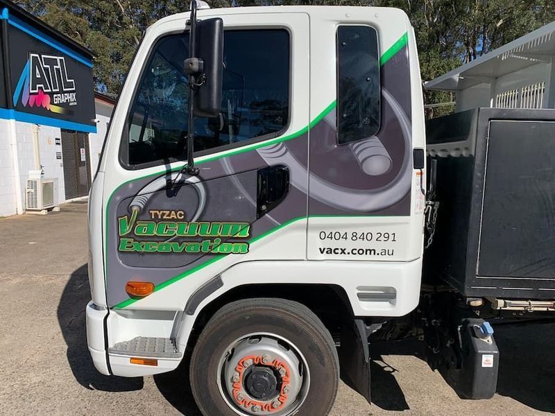 White Delivery Truck With Tyzac Vacuum Services Branding — Tyzac Group in South Brisbane, QLD