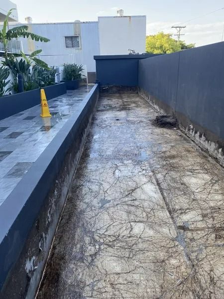 Exterior Concrete Area With Wet, Patterned Surface — Tyzac Group in Beerwah, QLD