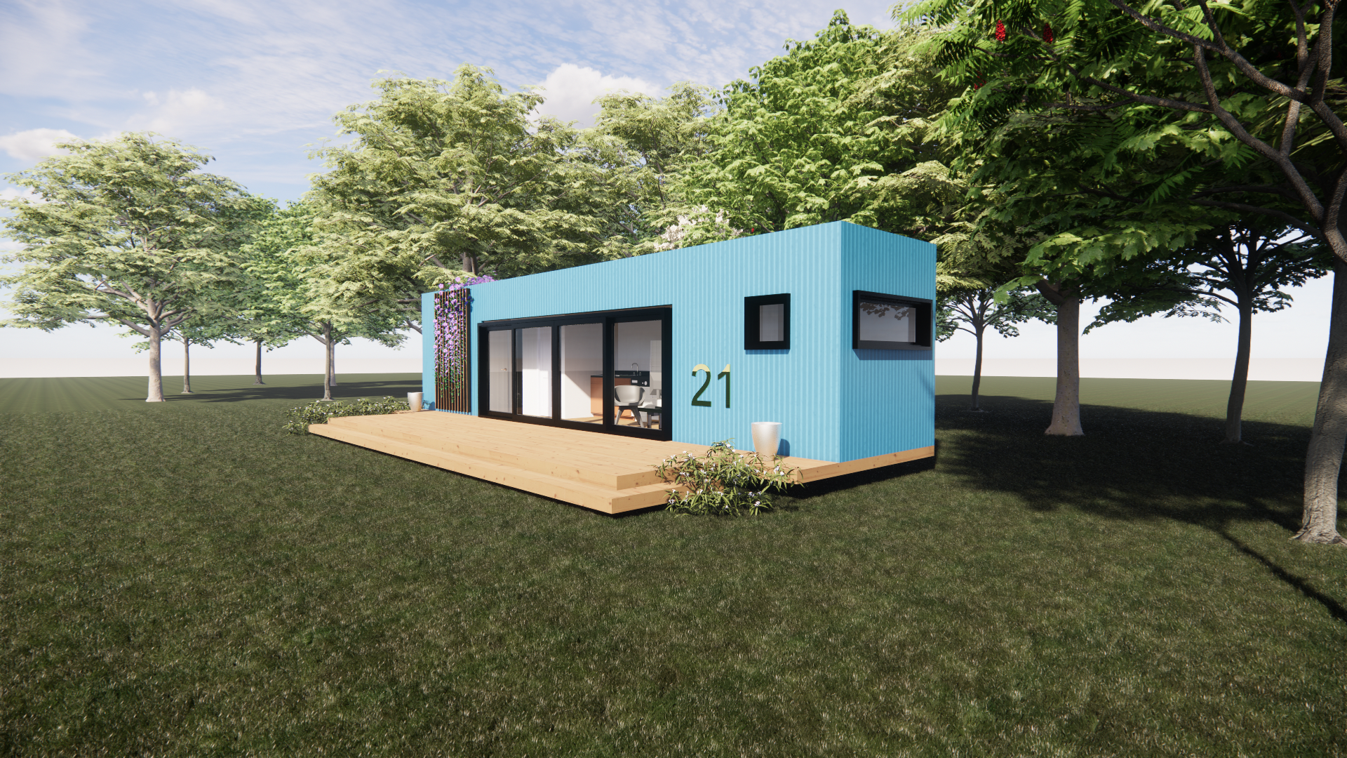 A blue house is sitting in the middle of a grassy field surrounded by trees.