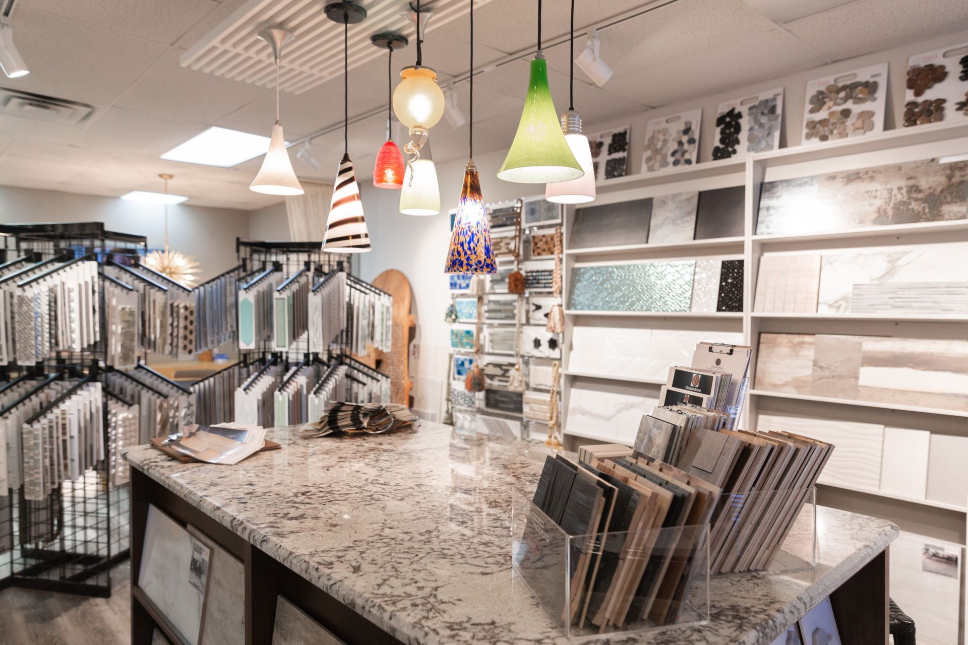 There are many different types of tiles on display in this store.
