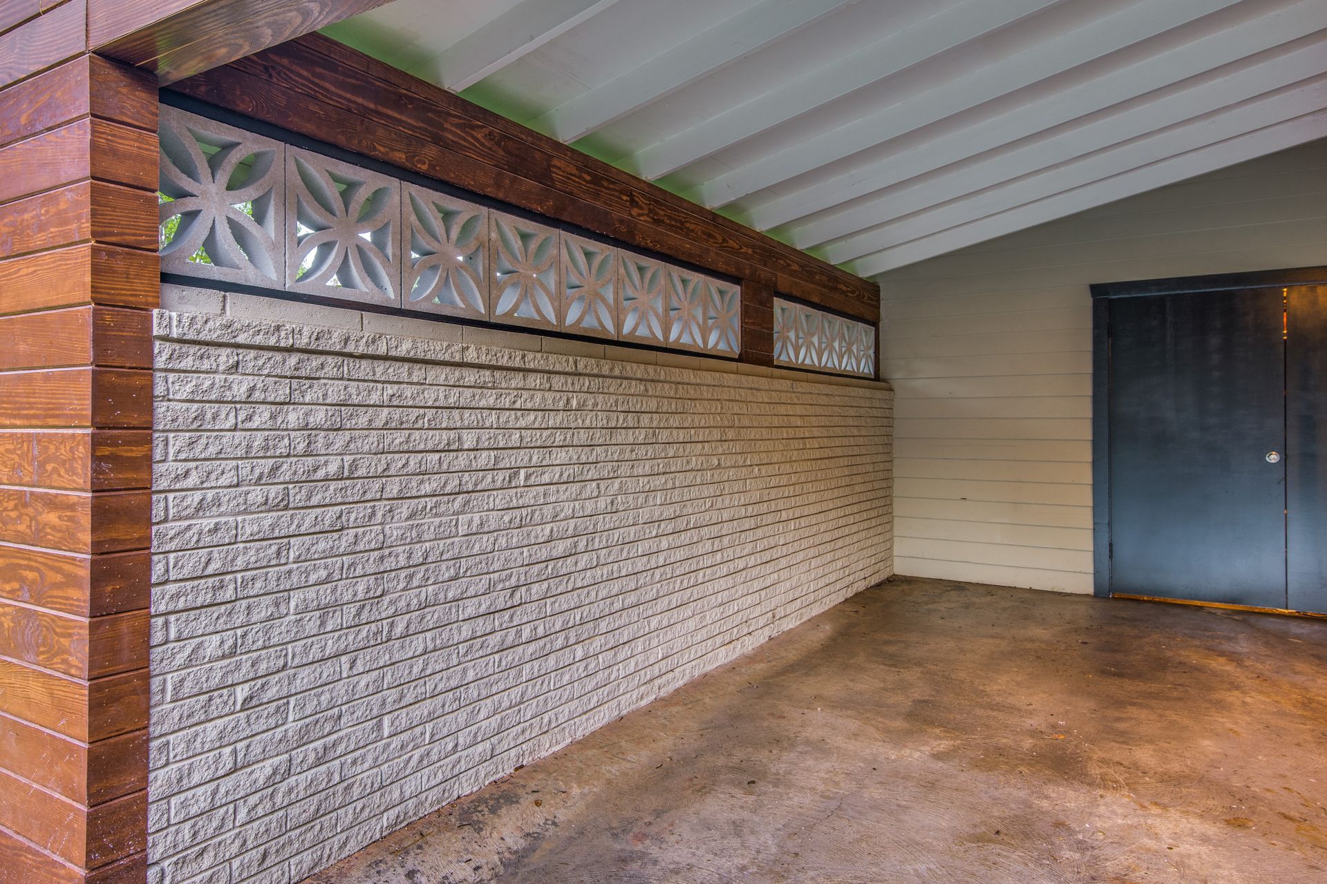 There is a brick wall in the middle of the room.