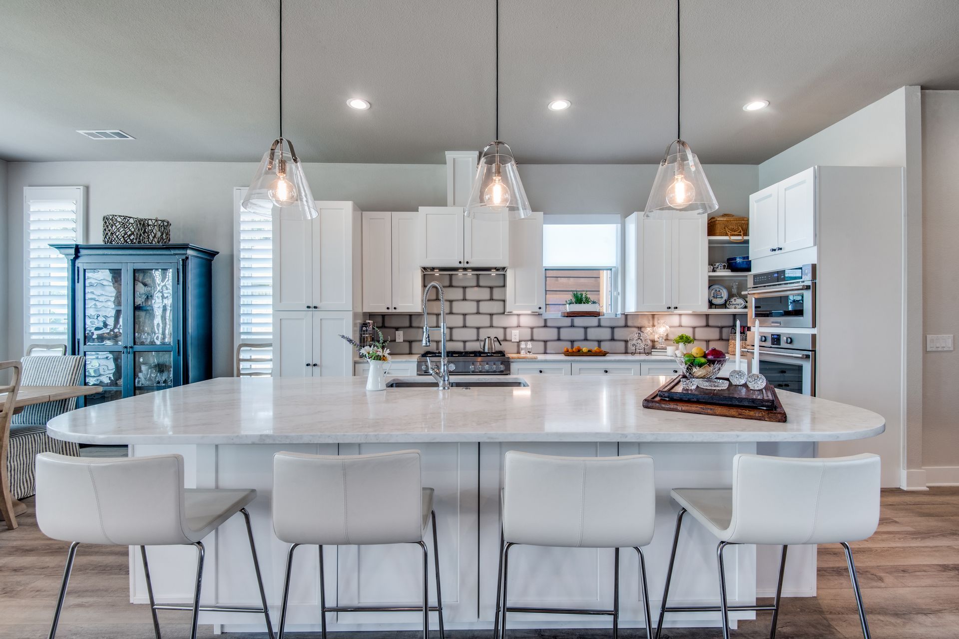 There is a large island in the middle of the kitchen.