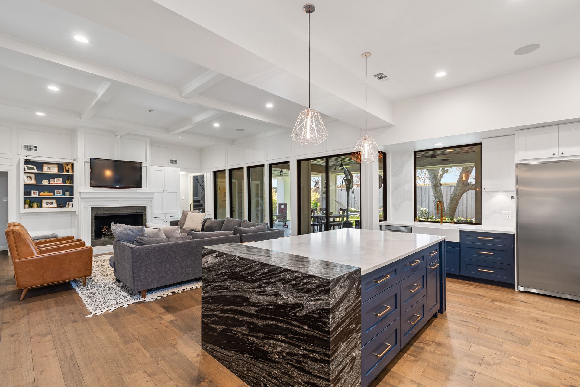 There is a large island in the middle of the kitchen.