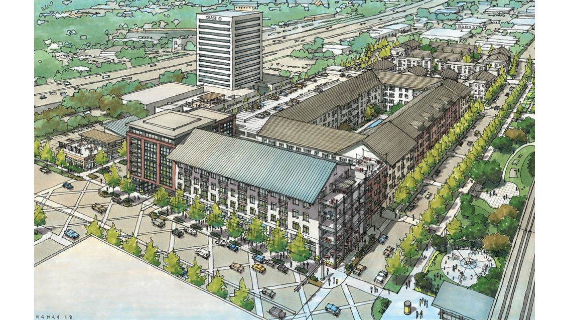 An aerial view of a city with lots of buildings and trees