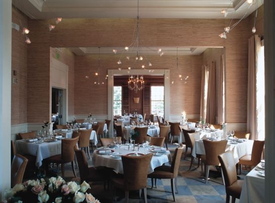 A large room filled with tables and chairs