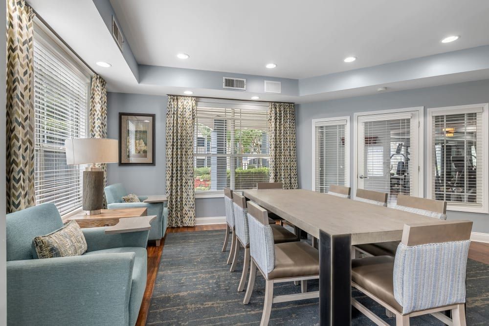 there is a long table in the middle of the room at Marquis Midtown West in Atlanta, GA.