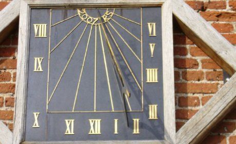Bronze sun dial clock