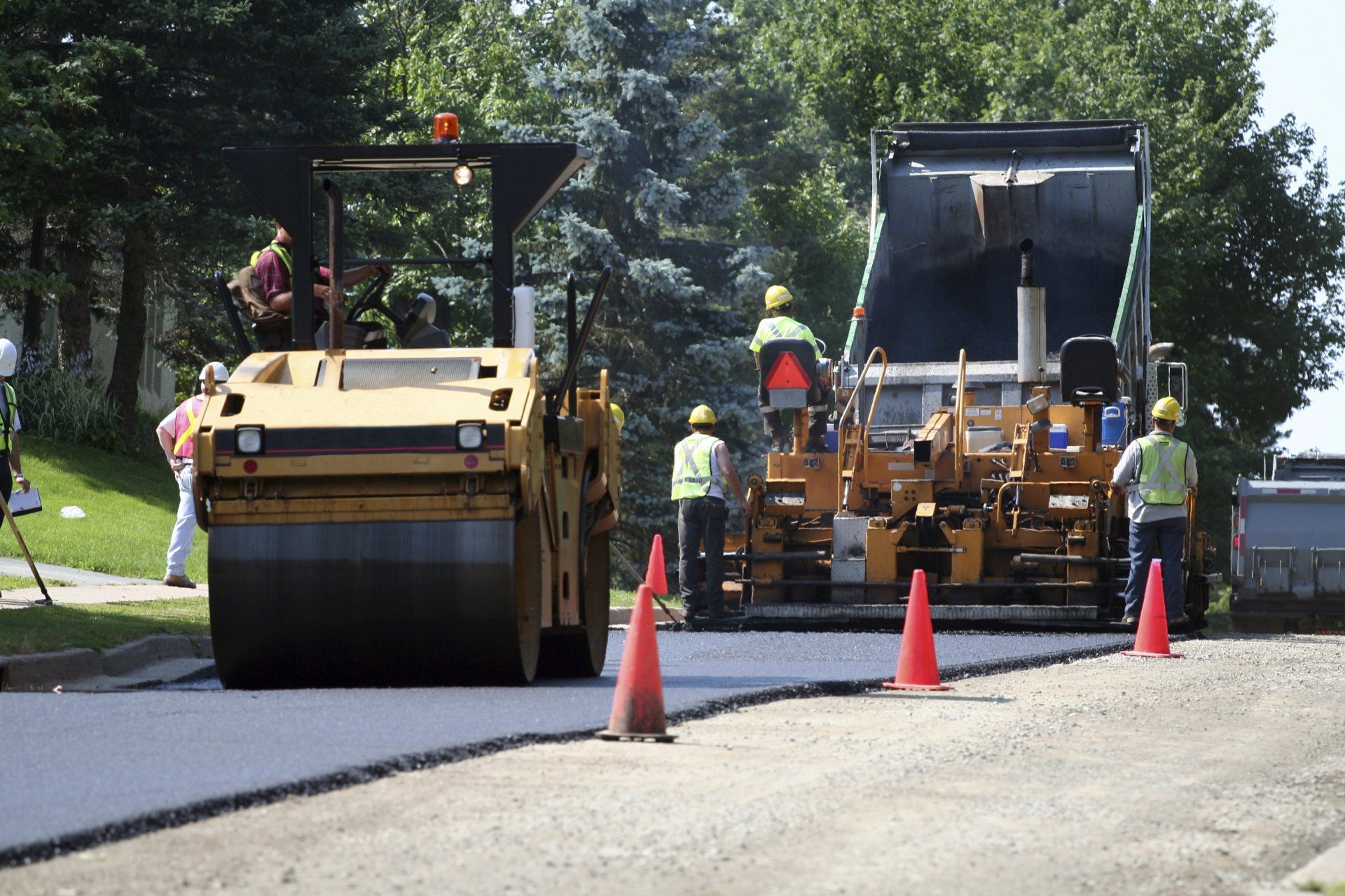 Yellow Tractor Fixing Road — Vacaville, CA — American Asphalt