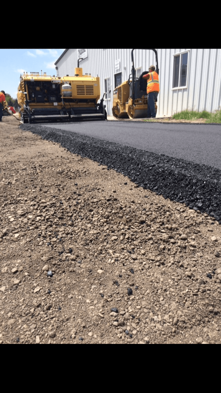 Tractor and Worker — Vacaville, CA — American Asphalt