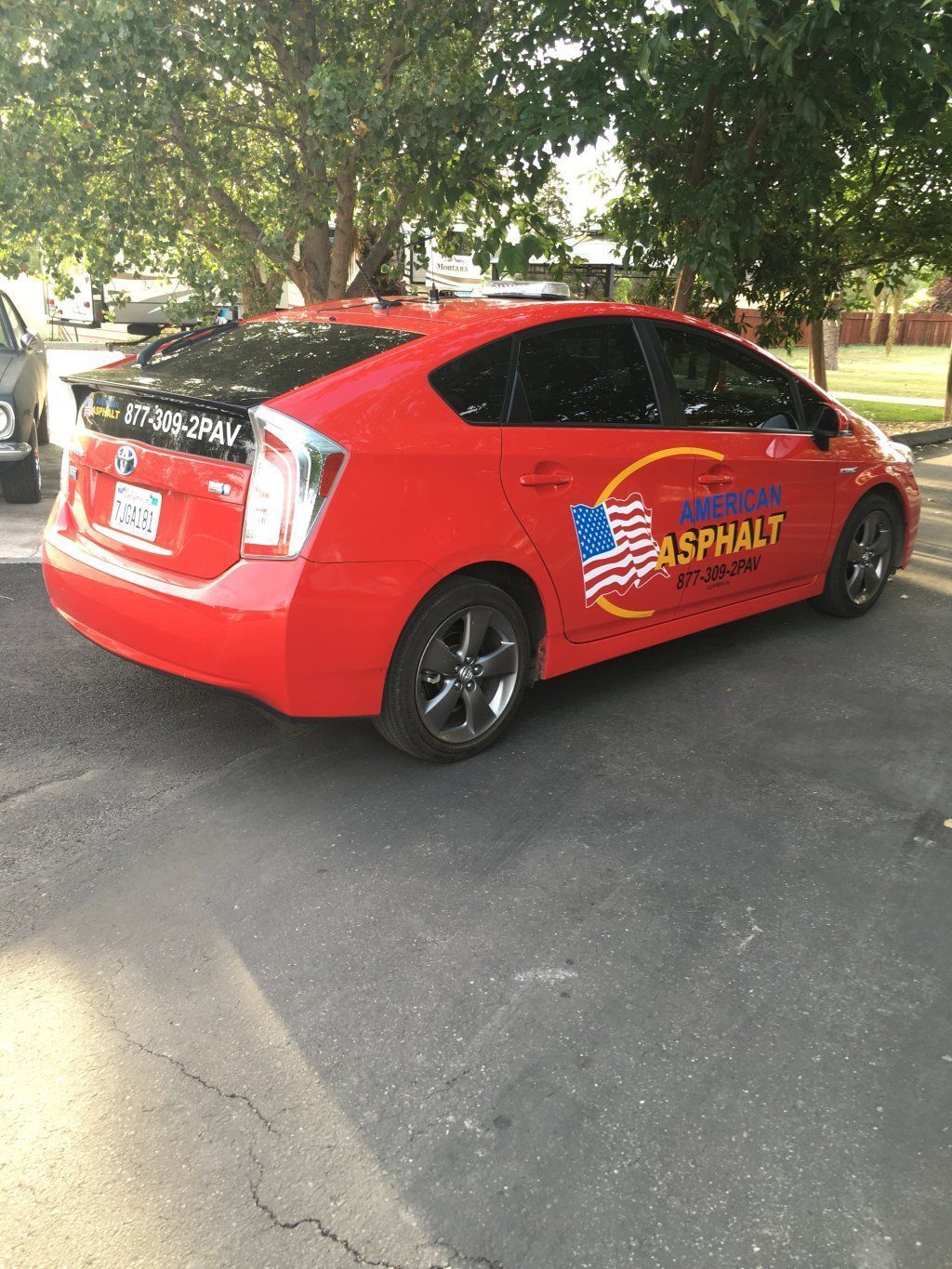 Red Business Car — Vacaville, CA — American Asphalt