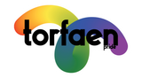A logo for torfaen pride with a rainbow in the middle