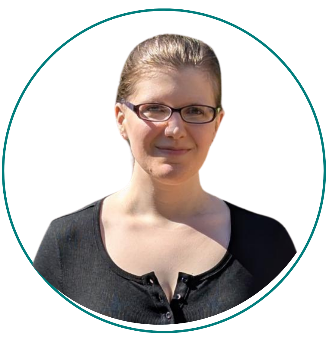 Woman with light brown hair smiles at the camera, wearing a gray shirt and necklace, set in a round orange frame.
