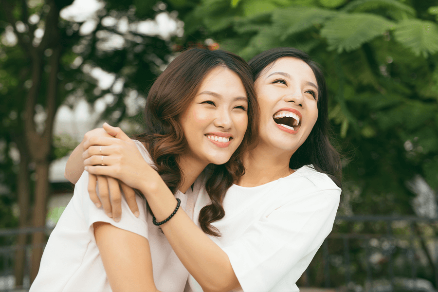 Two Woman Smiling