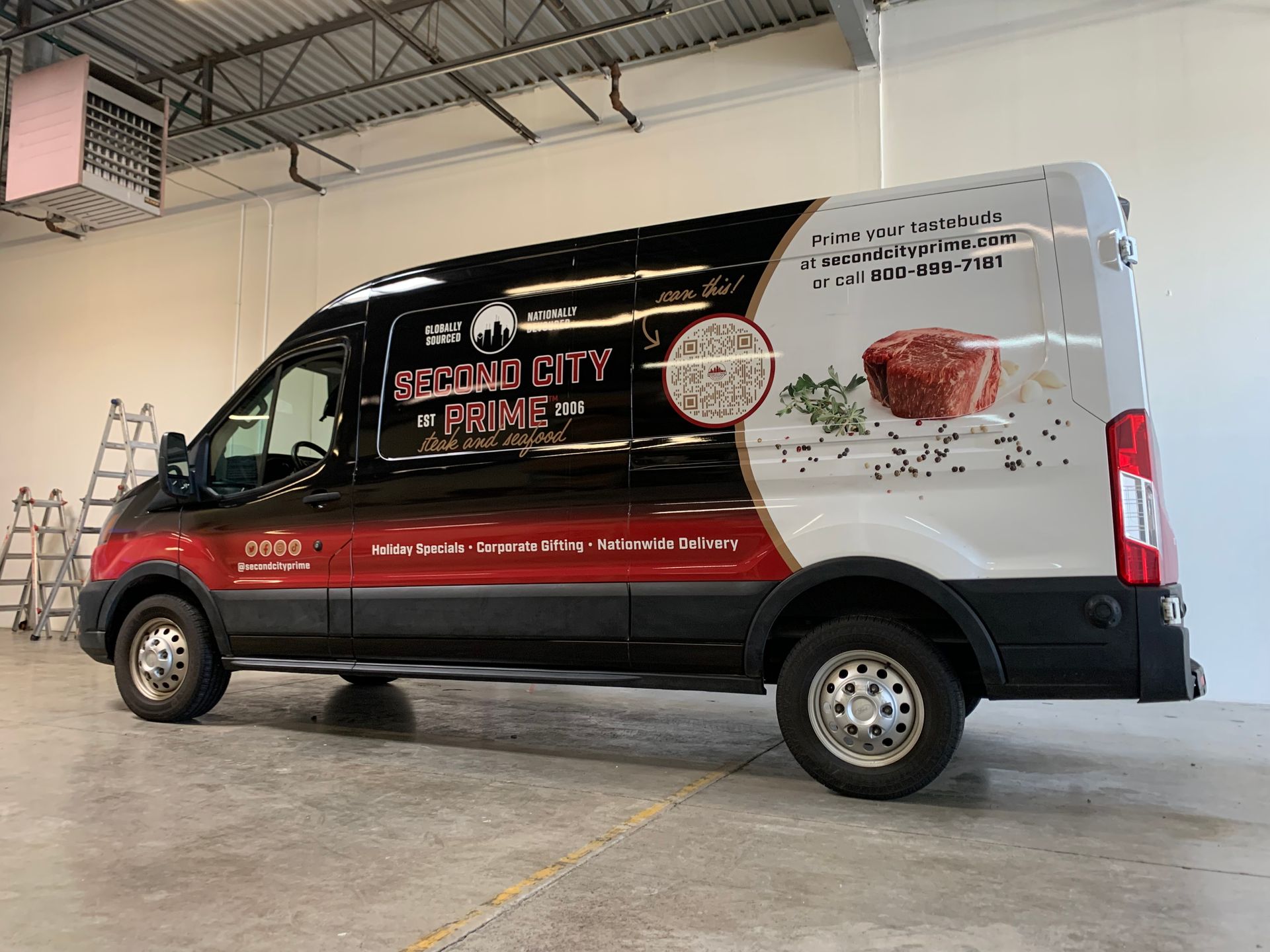 Black and white delivery van with 