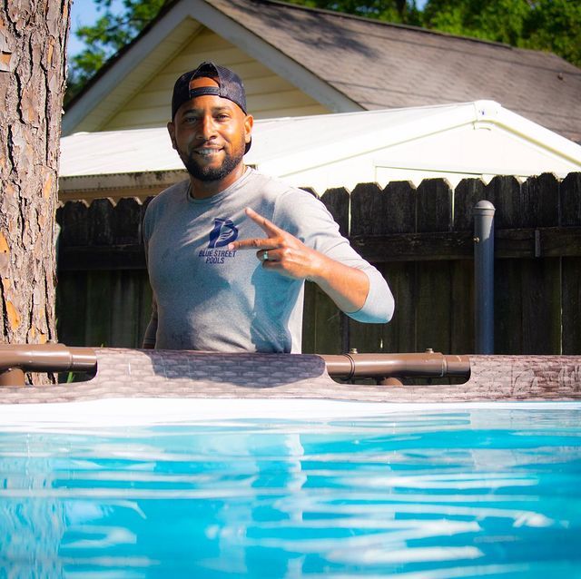 Man Showing Peace Sign — New Orleans, LA — Blue Street Pools