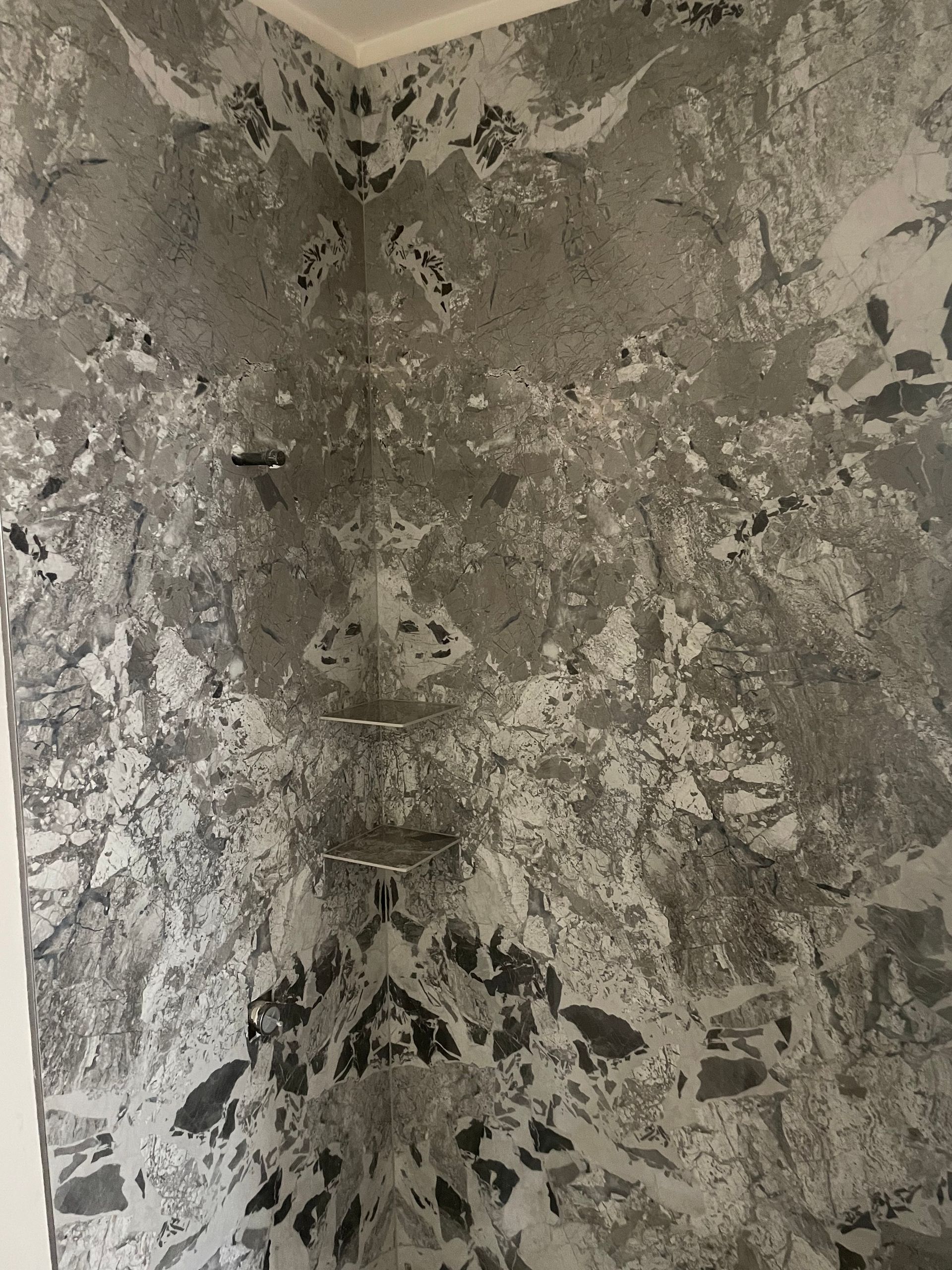 A close up of a wall with a pattern on it.