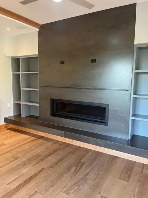 There is a fireplace in the middle of the room.