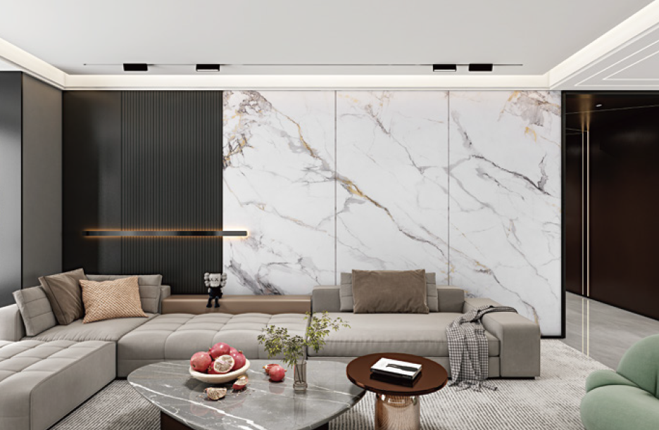 A living room with a couch , coffee table , and marble wall.