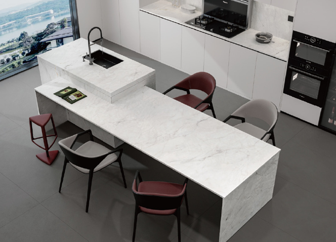 An aerial view of a kitchen with a large table and chairs.