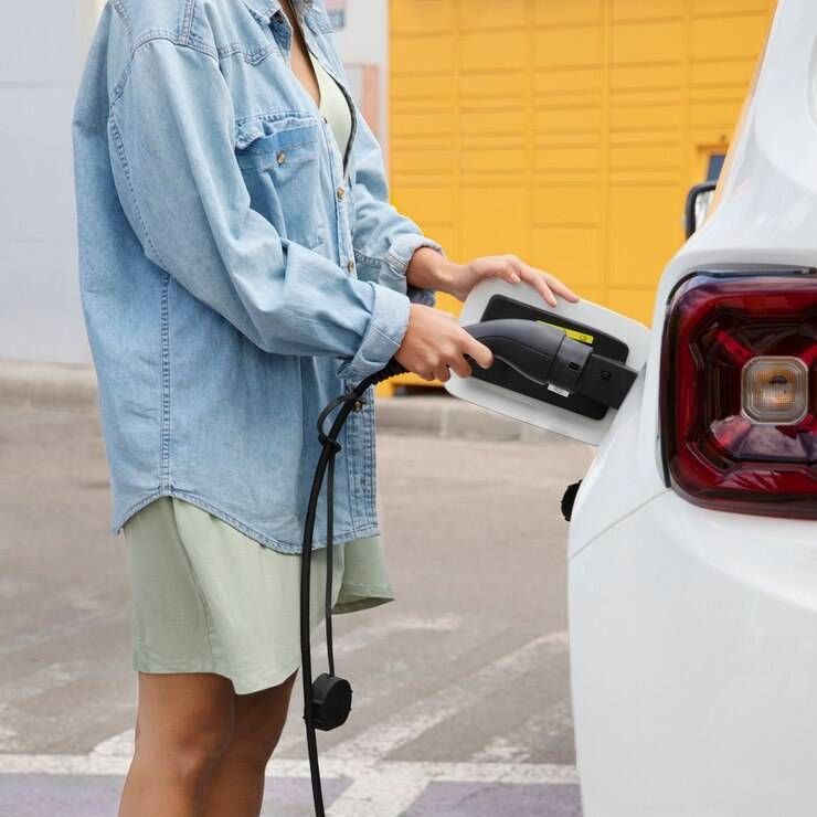 electrician inspecting a newly installed electrical panel