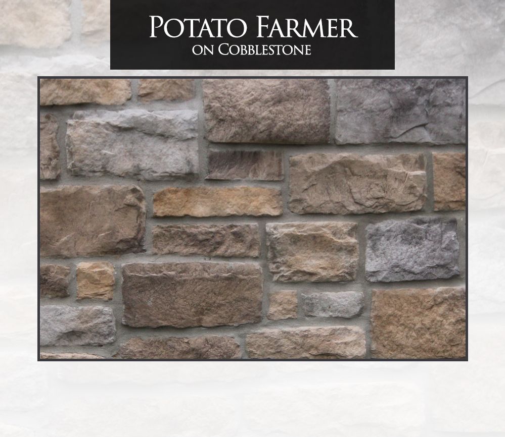 Text on a cobblestone wall; 