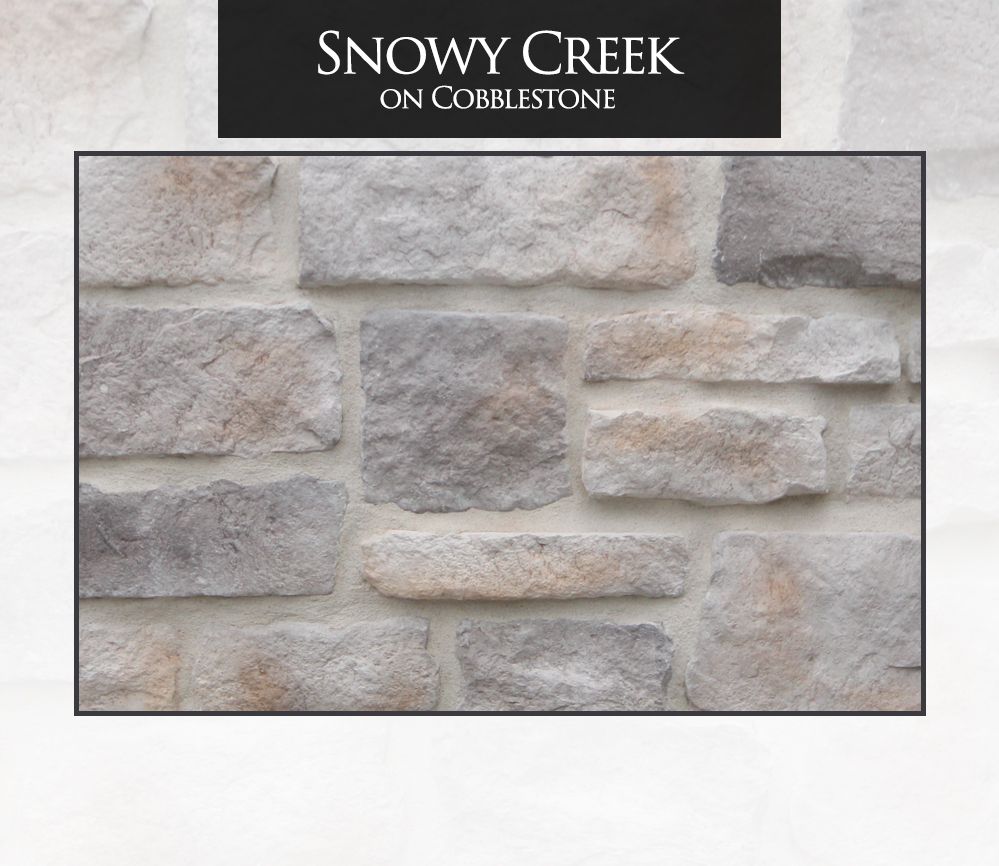 Stone wall in shades of gray, beige, and brown, labeled 
