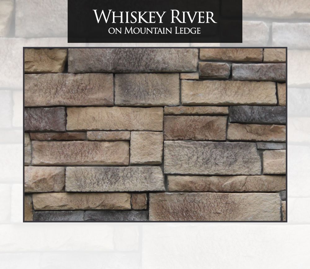 Whiskey River mountain ledge stone veneer in various earthy tones.