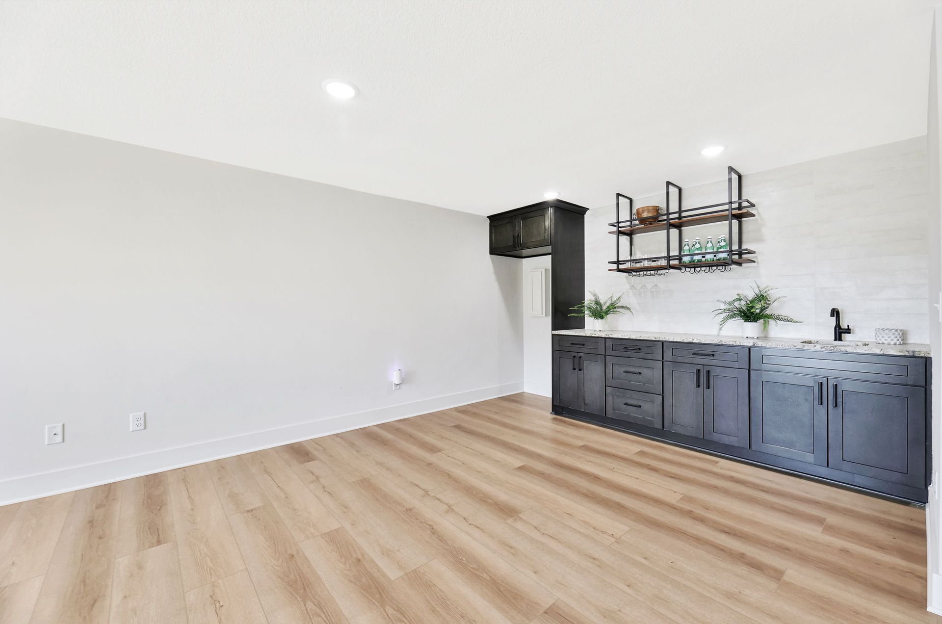 home basement with luxury vinyl flooring