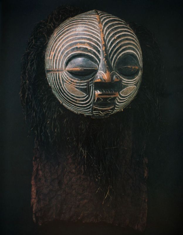 This striated kifwebe mask hails from the Democratic Republic of Congo