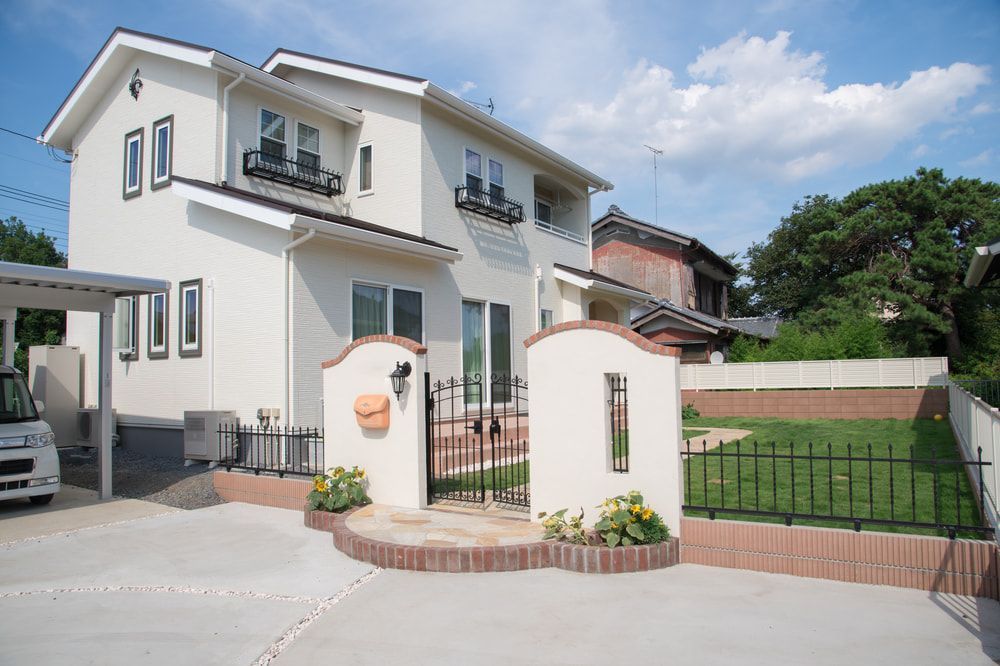 White House With A Car Parked In Front Of It — Pro Vision Property Inspections In Merewether, NSW